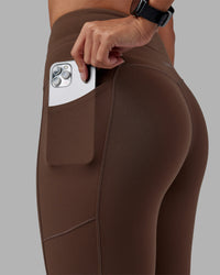 Woman wearing Effortless Drawstring Ultra High-Rise Full Length Legging Pockets - Chocolate Martini | Model:Rhiley | Size:S