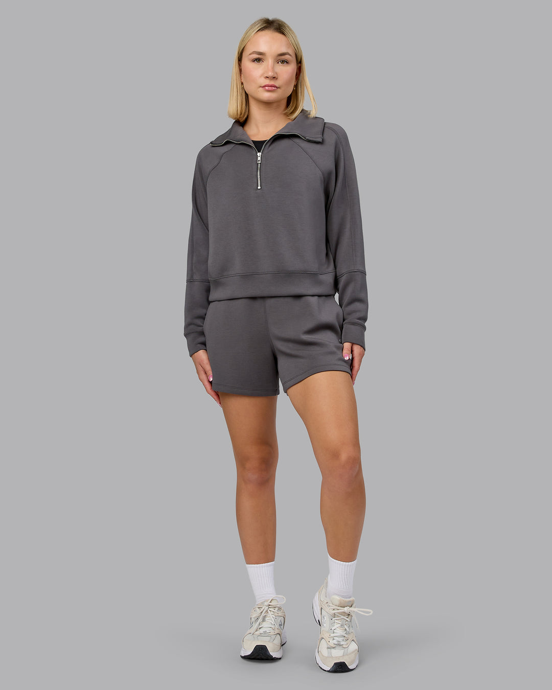Woman wearing Elevate SoftTouch 1/2 Zip Sweater - Asphalt | Model:Halle | Size:S
