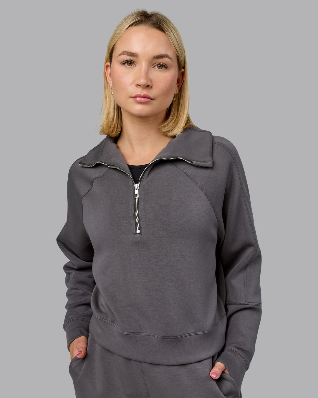 Woman wearing Elevate SoftTouch 1/2 Zip Sweater - Asphalt | Model:Halle | Size:S