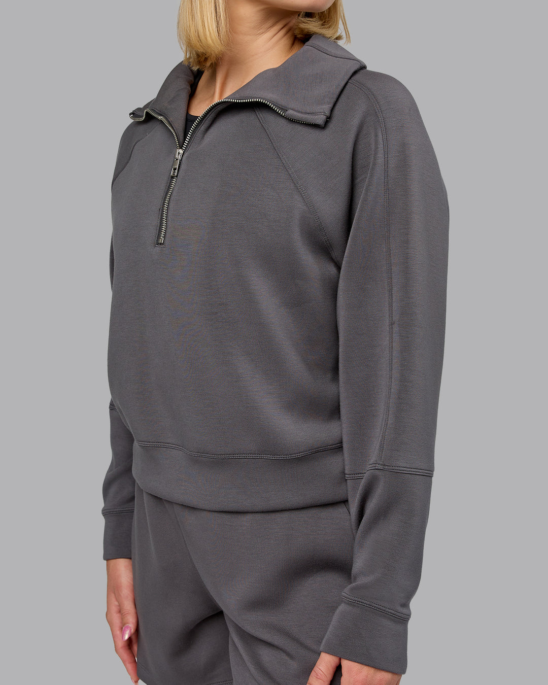 Woman wearing Elevate SoftTouch 1/2 Zip Sweater - Asphalt | Model:Halle | Size:S