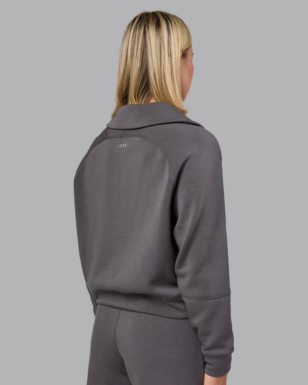 Woman wearing Elevate SoftTouch 1/2 Zip Sweater - Asphalt | Model:Halle | Size:S