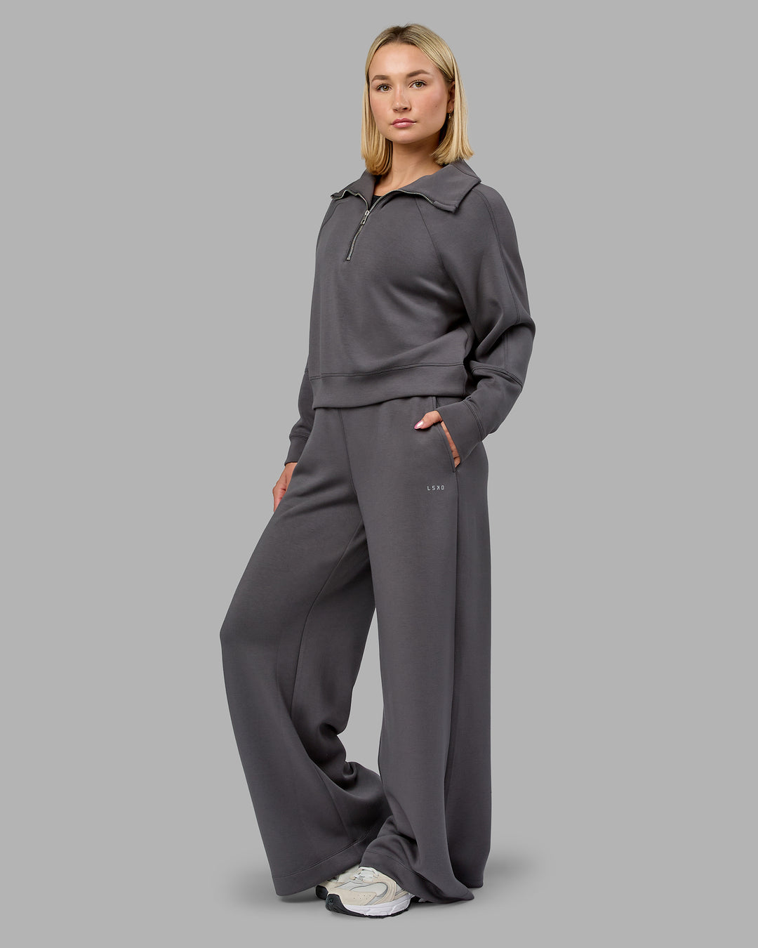 Woman wearing Elevate SoftTouch 1/2 Zip Sweater - Asphalt | Model:Halle | Size:S