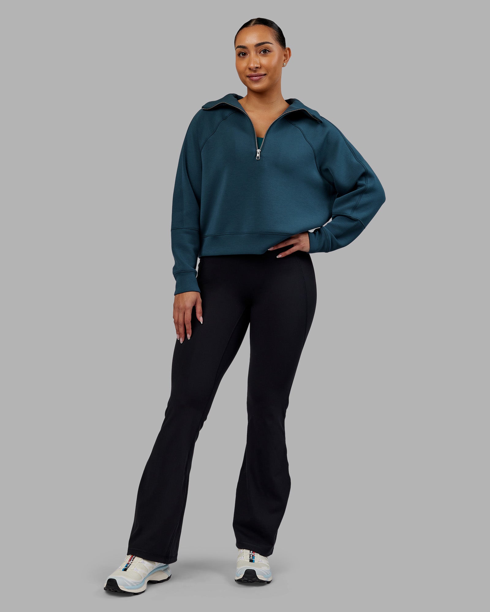 Woman wearing Elevate SoftTouch 1/2 Zip Sweater - Deep Sea | Model:Ayla | Size:S