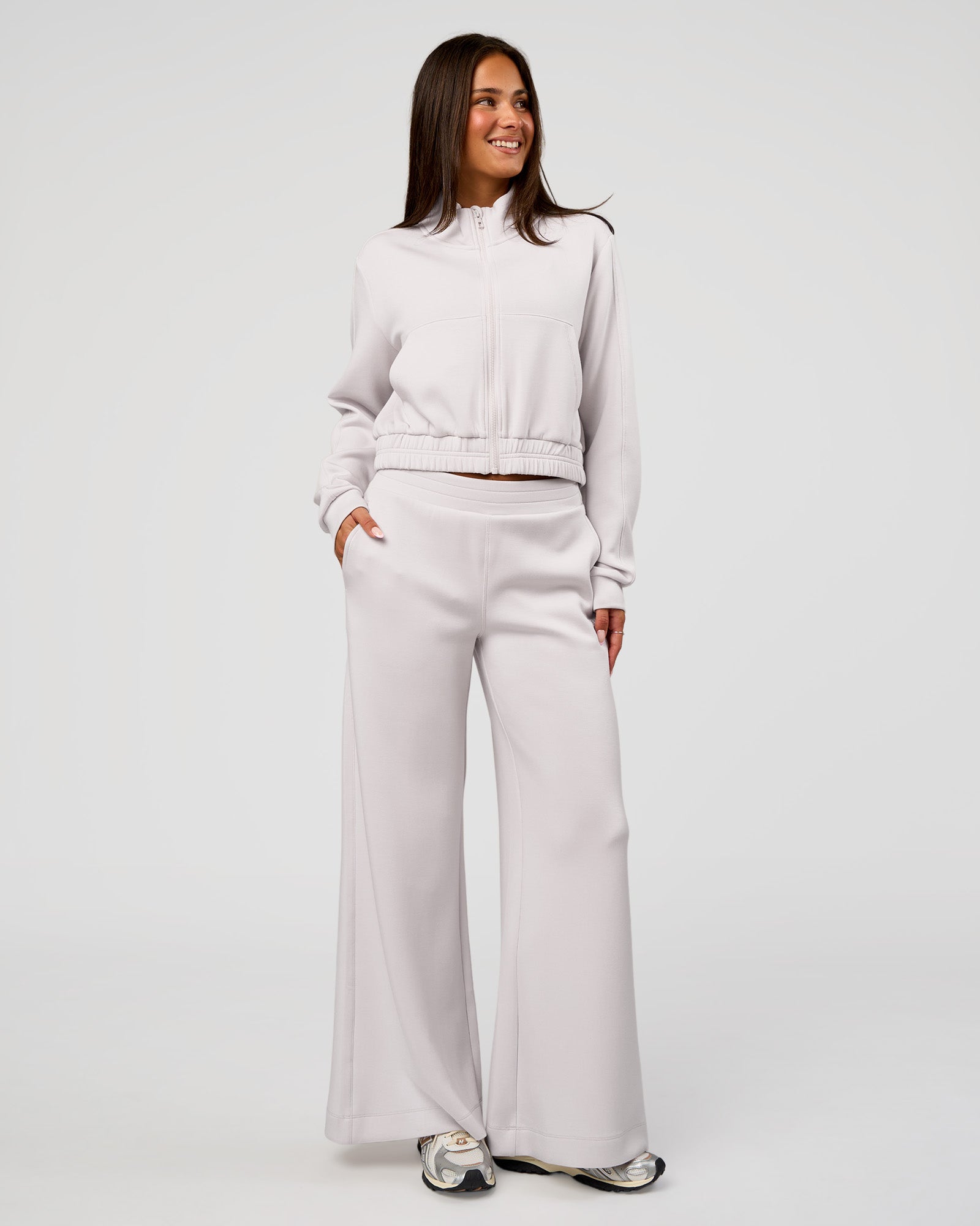 Woman wearing Elevate SoftTouch Cropped Full Zip Jacket - Clay | Model:Bianca | Size:S