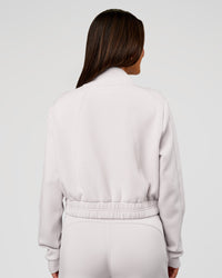 Woman wearing Elevate SoftTouch Cropped Full Zip Jacket - Clay | Model:Bianca | Size:S