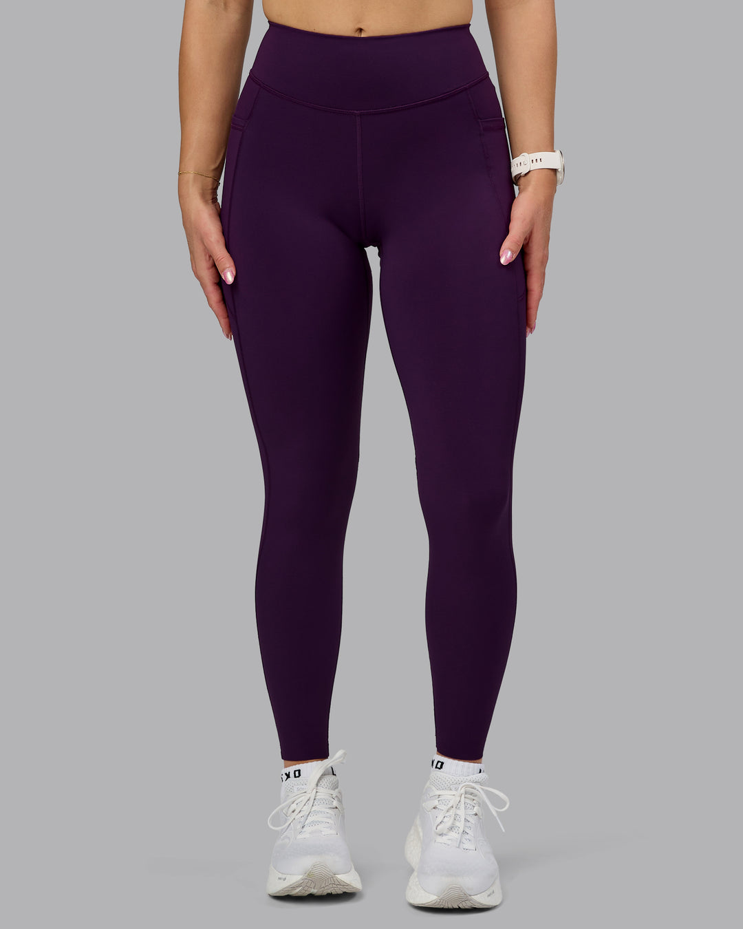 Woman wearing Elite High-Rise Full Length Legging Pockets - Deep Purple | Mode:Halle | Size:S