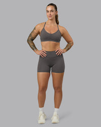 Woman wearing Elite High-Rise 4" Short Pockets - Dark Storm | Model:Robyn | Size:S | Thumbnail Index: 4