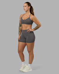 Woman wearing Elite High-Rise 4" Short Pockets - Dark Storm | Model:Robyn | Size:S | Thumbnail Index: 6