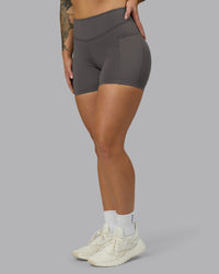 Woman wearing Elite High-Rise 4" Short Pockets - Dark Storm | Model:Robyn | Size:S | Thumbnail Index: 7
