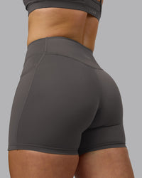 Woman wearing Elite High-Rise 4" Short Pockets - Dark Storm | Model:Robyn | Size:S | Thumbnail Index: 8