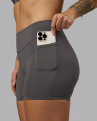 Woman wearing Elite High-Rise 4" Short Pockets - Dark Storm | Model:Robyn | Size:S | Thumbnail Index: 5