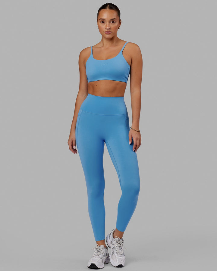 Woman wearing Elixir 7/8 Tights With Pockets - Azure Blue
