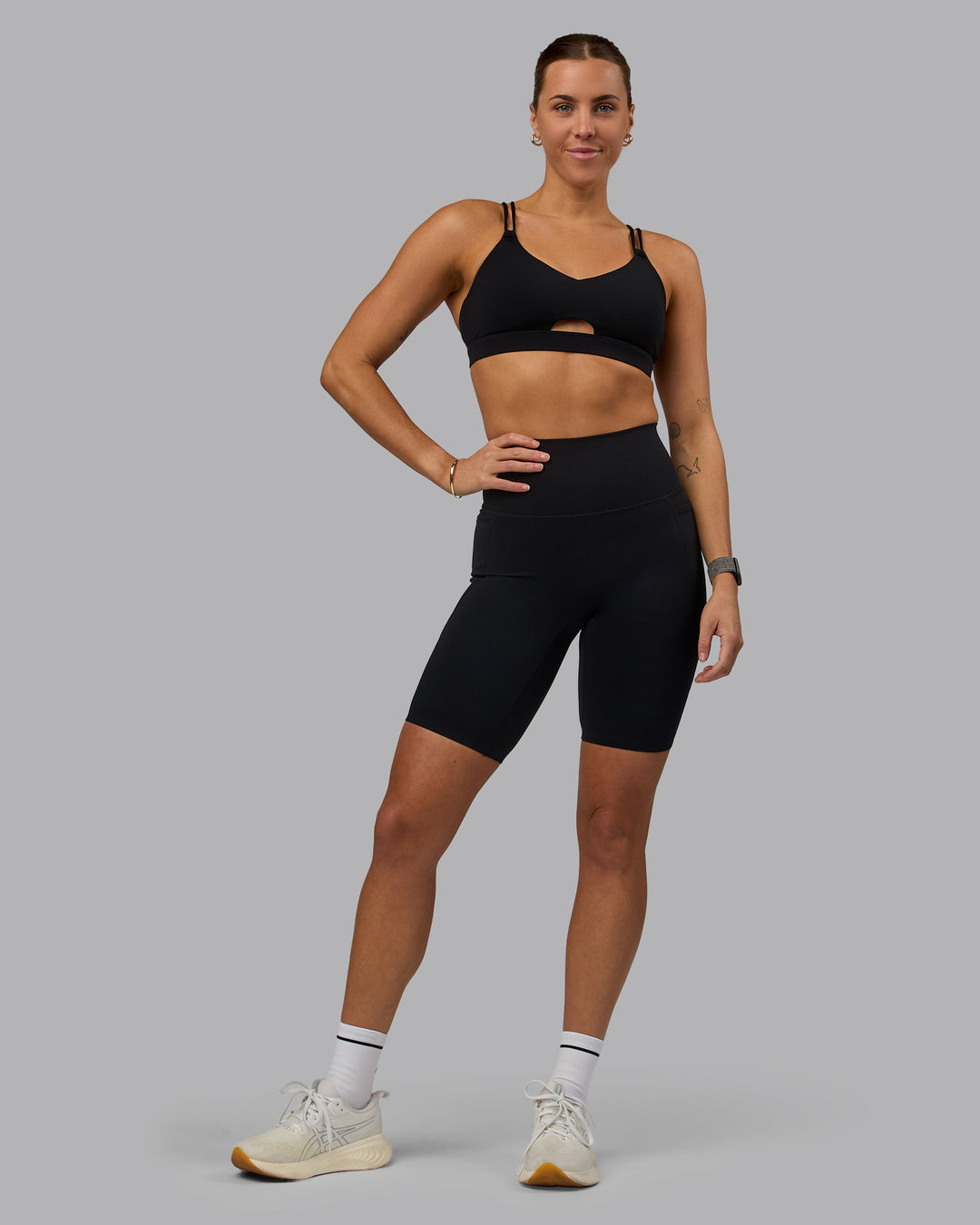 Woman wearing Elixir Ultra High-Rise 9&quot; Short Pockets - Black | Model:Shae | Size:S
