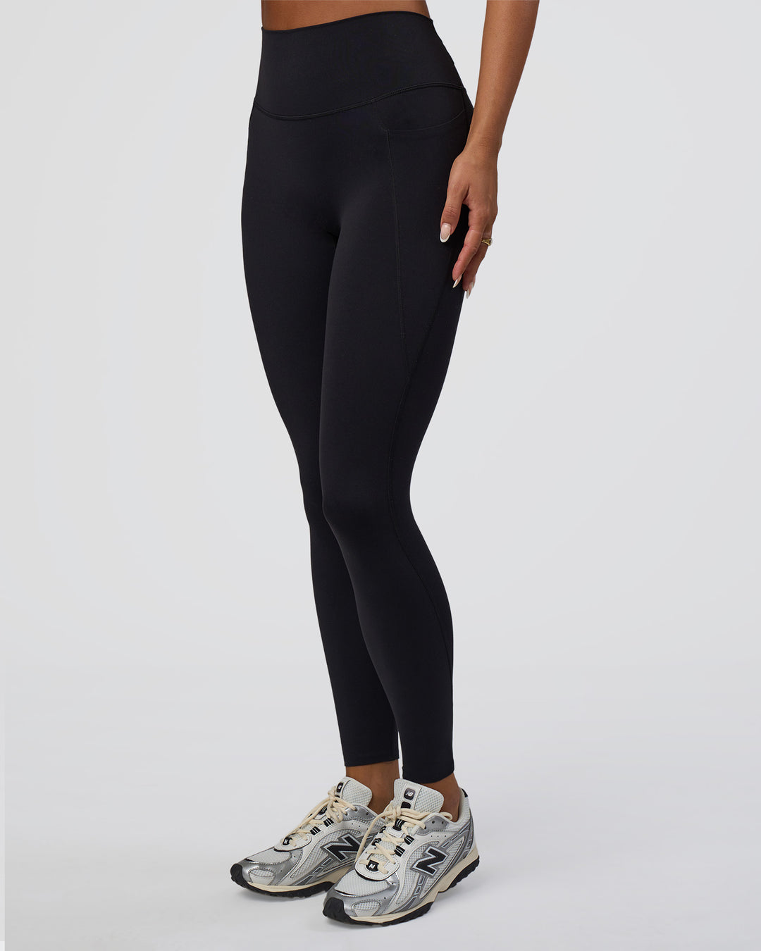 Woman wearing Elixir Defined High-Rise Full Length Legging Pockets - Black | Model:Bianca | Size:S