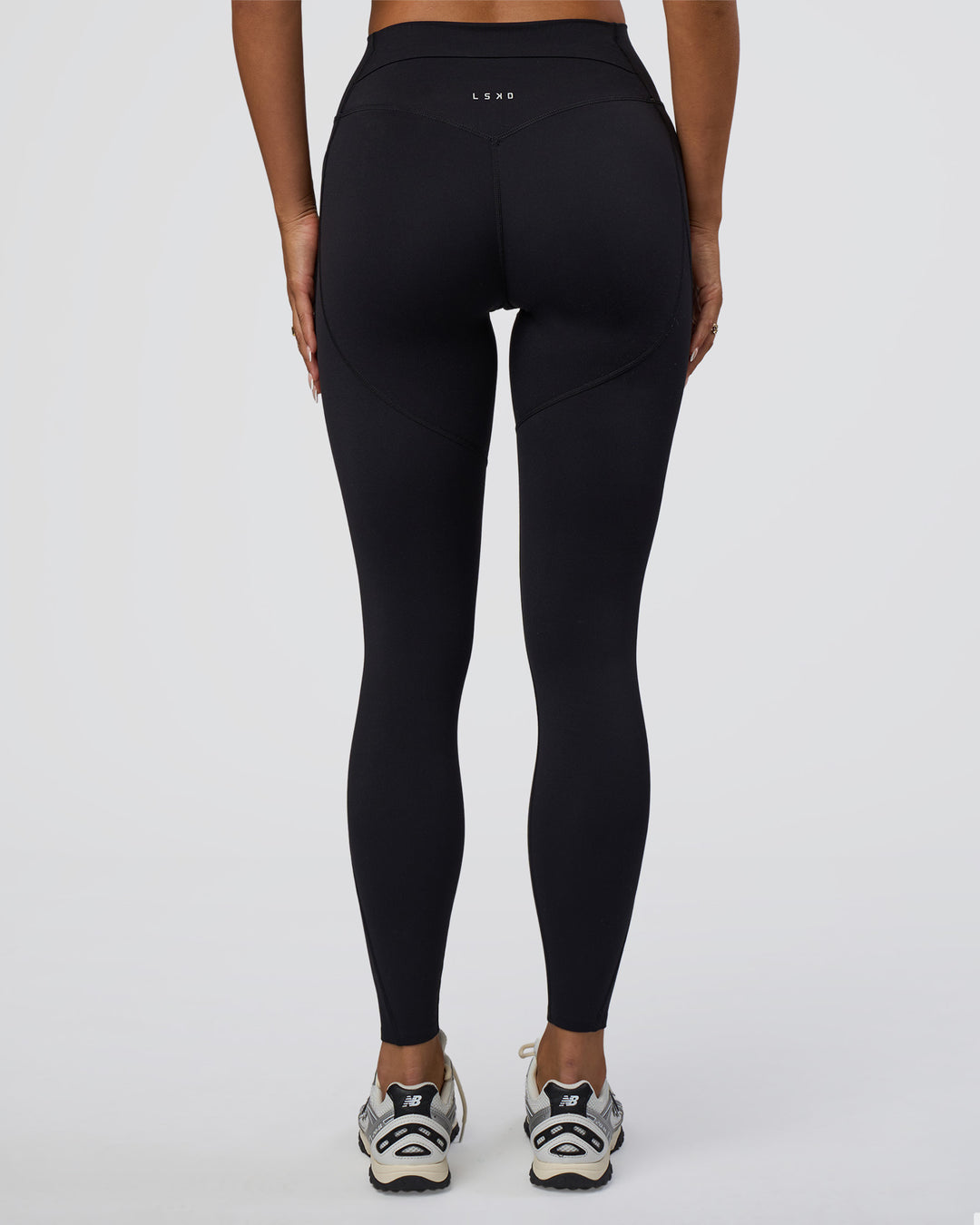 Woman wearing Elixir Defined High-Rise Full Length Legging Pockets - Black | Model:Bianca | Size:S