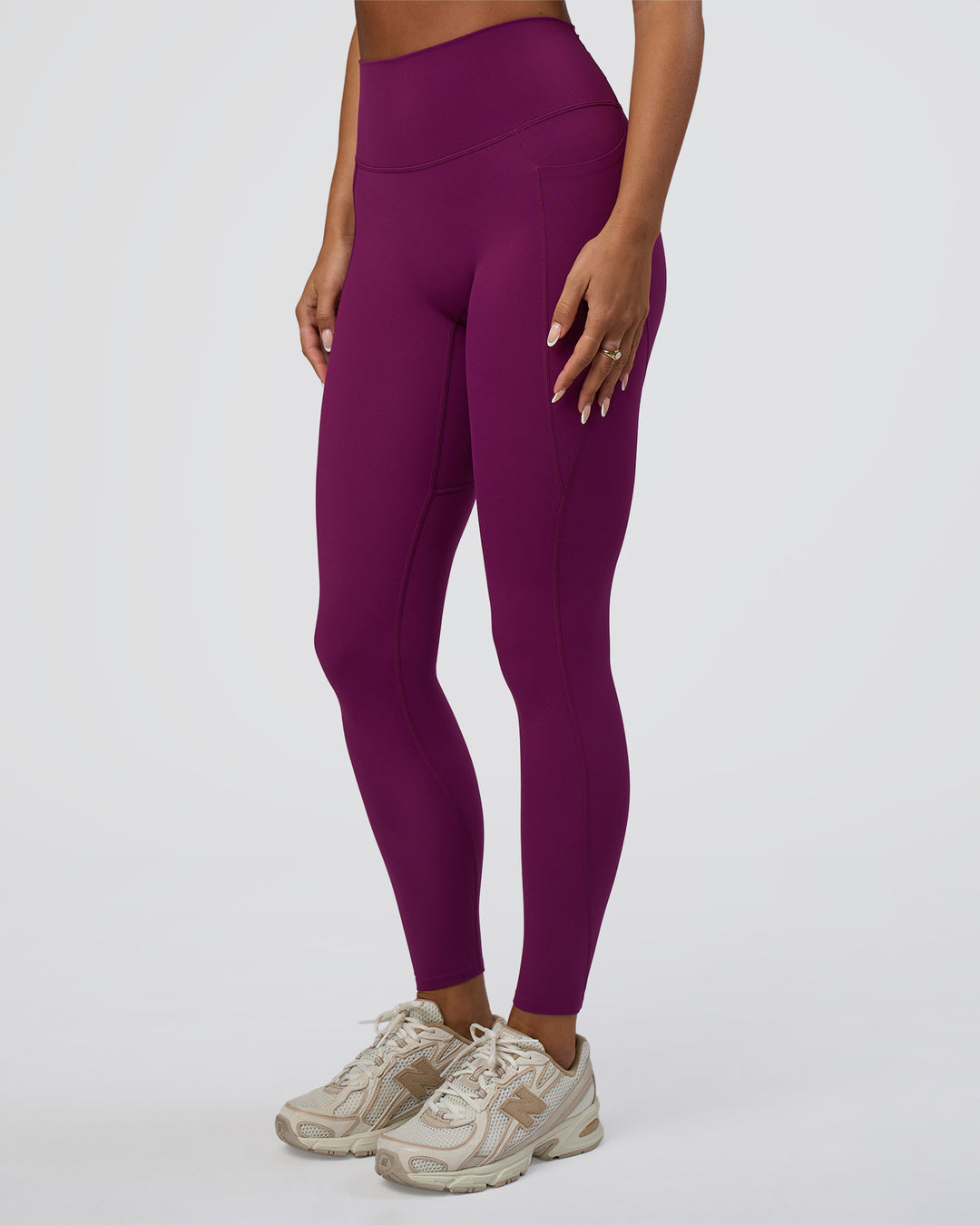 Woman wearing Elixir Defined High-Rise Full Length Legging Pockets - Plum Caspia | Model:Bianca | Size:S