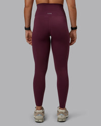 Woman wearing Elixir Ultra High-Rise Full Length Legging - Cherry Lacquer | Size:S
