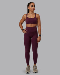 Woman wearing Elixir Ultra High-Rise Full Length Legging - Cherry Lacquer | Size:S