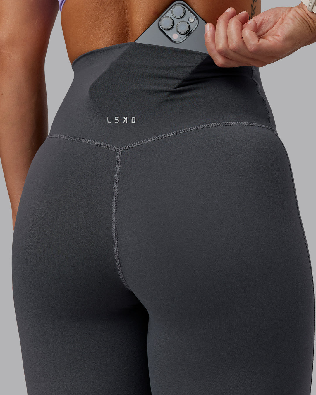 Woman wearing Elixir Ultra High-Rise Full Length Legging - Dark Storm | Size:S