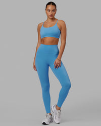 Woman wearing Elixir Ultra High-Rise Full Length Legging Pockets - Azure Blue
