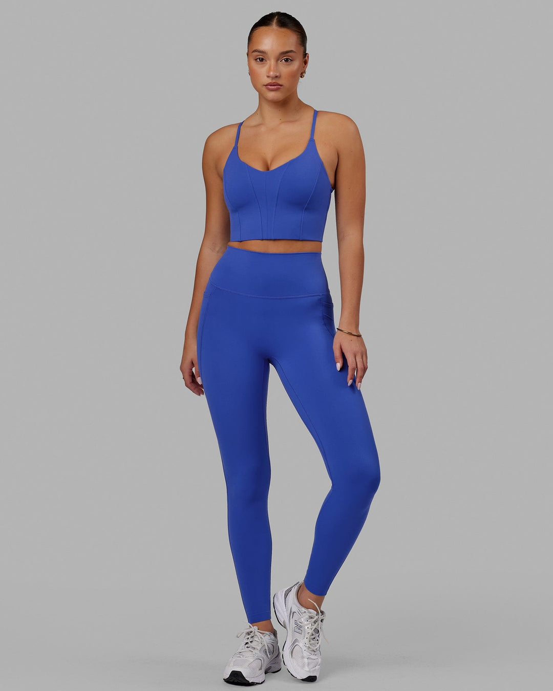 Woman wearing Elixir Ultra High-Rise Full Length Legging Pockets - Power Cobalt