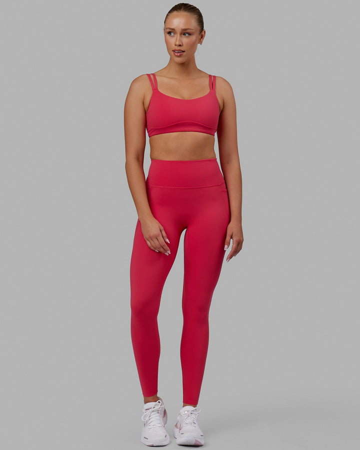 Woman wearing Elixir Full Length Tights With Pockets - Raspberry