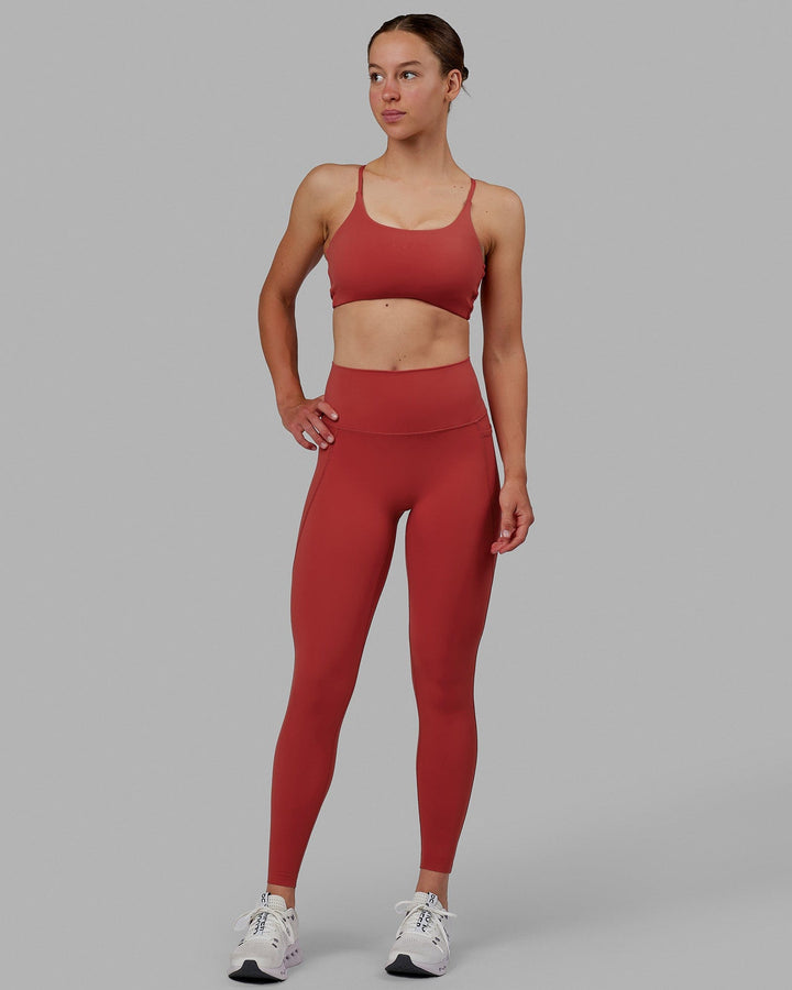Woman wearing Elixir Full Length Tights With Pockets - Cardinal