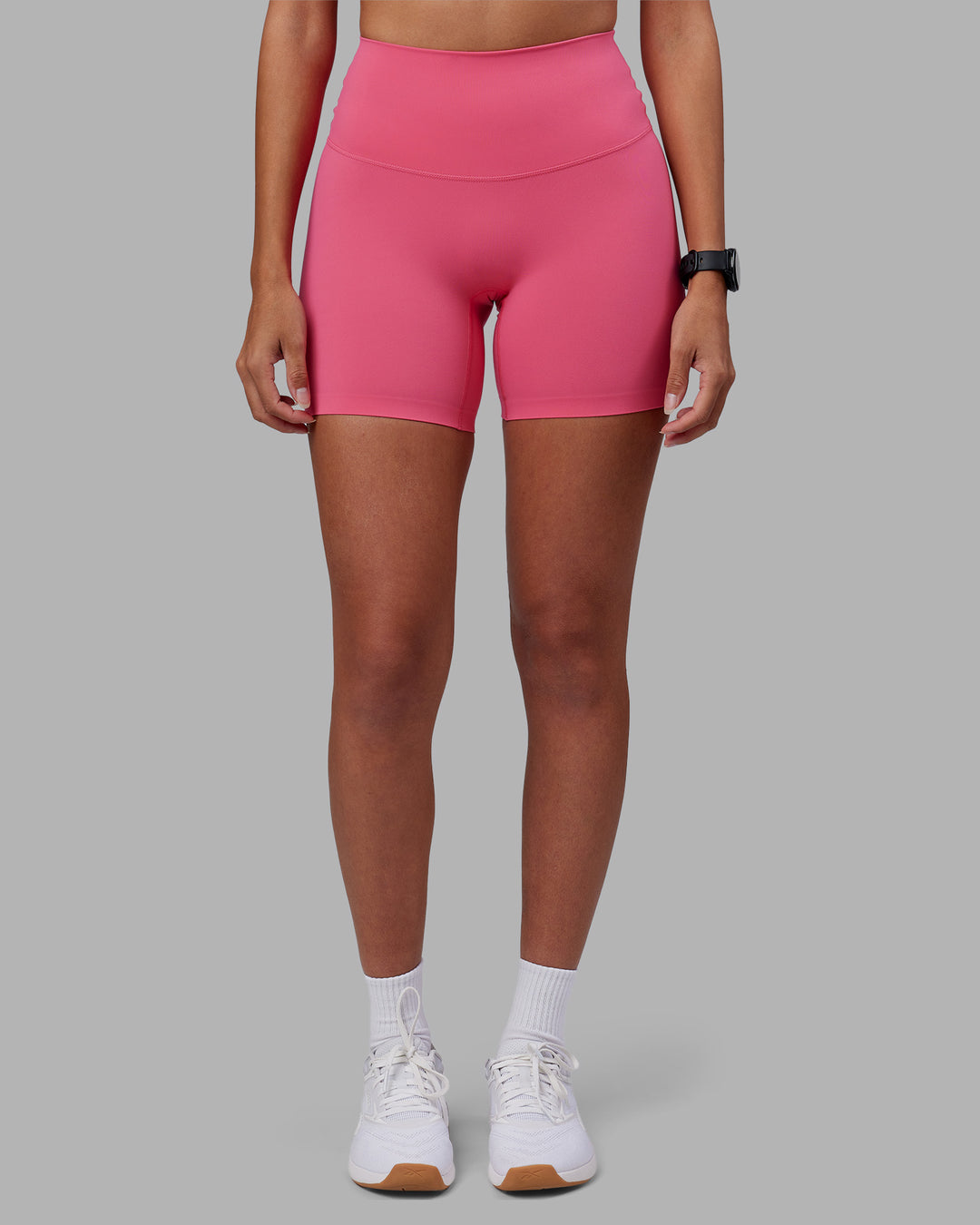 Woman wearing Elixir High-Rise 6&quot; Short - Hot Pink | Model:Rhiley | Size:S