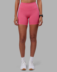 Woman wearing Elixir High-Rise 6" Short - Hot Pink | Model:Rhiley | Size:S