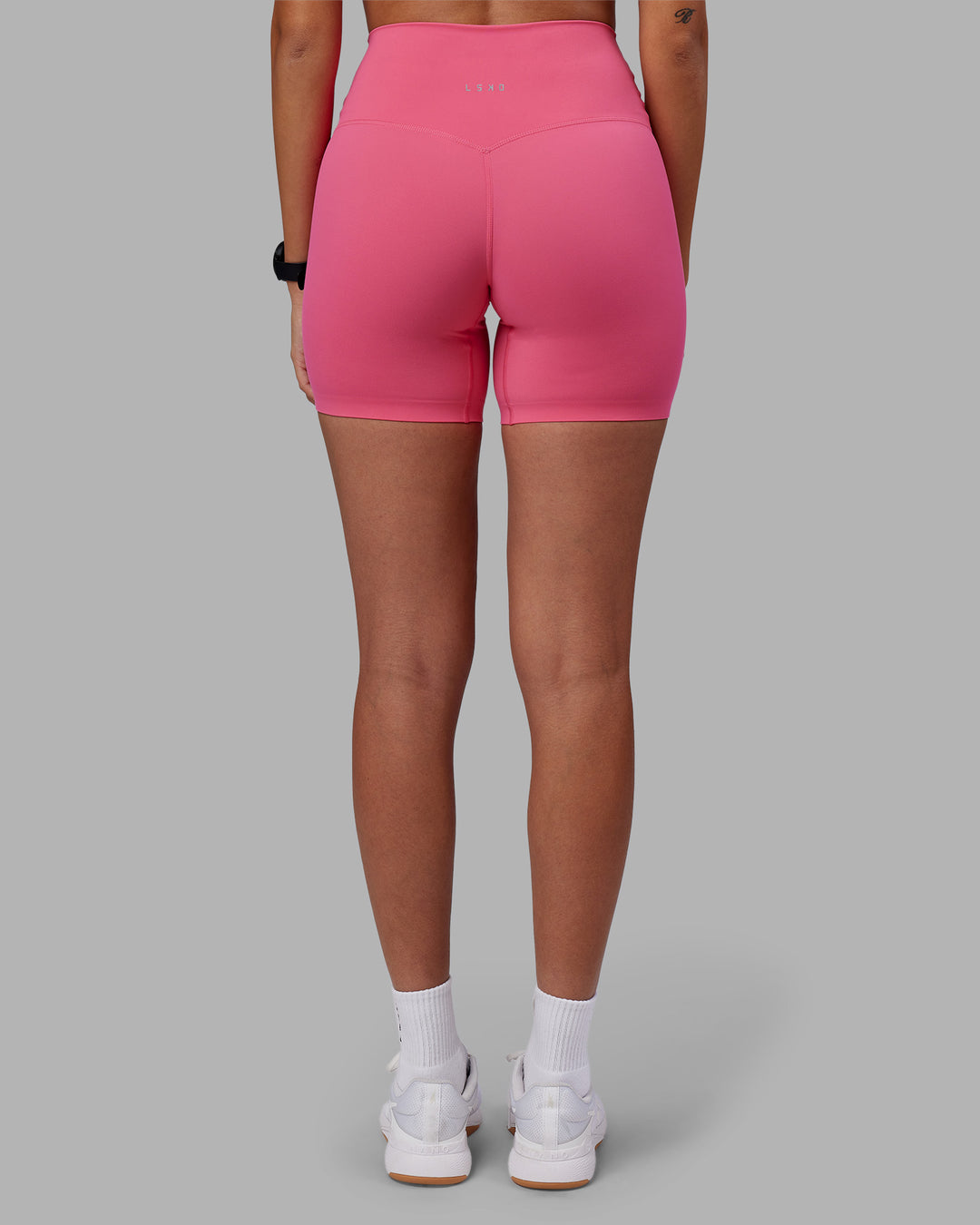 Woman wearing Elixir High-Rise 6&quot; Short - Hot Pink | Model:Rhiley | Size:S