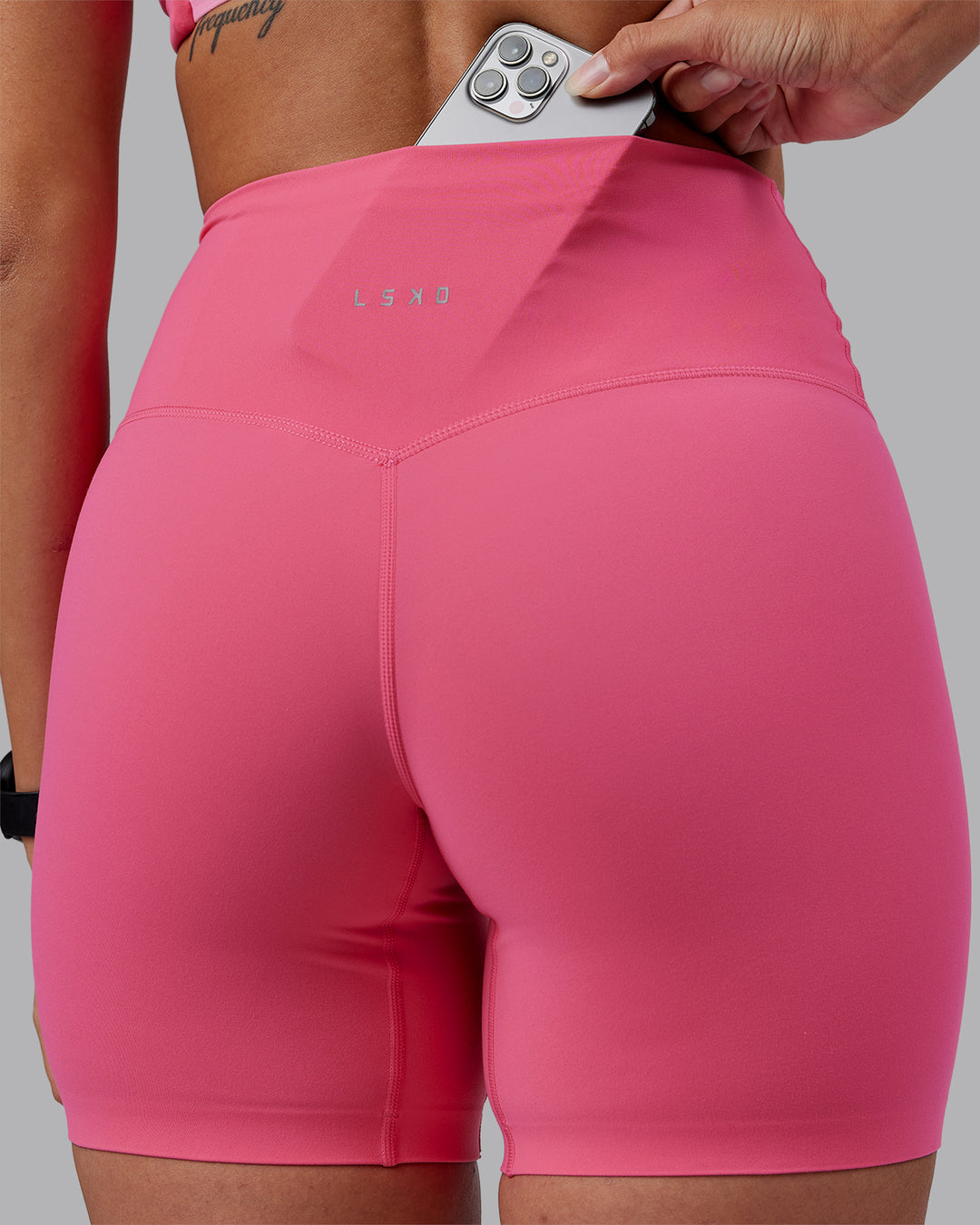 Woman wearing Elixir High-Rise 6&quot; Short - Hot Pink | Model:Rhiley | Size:S