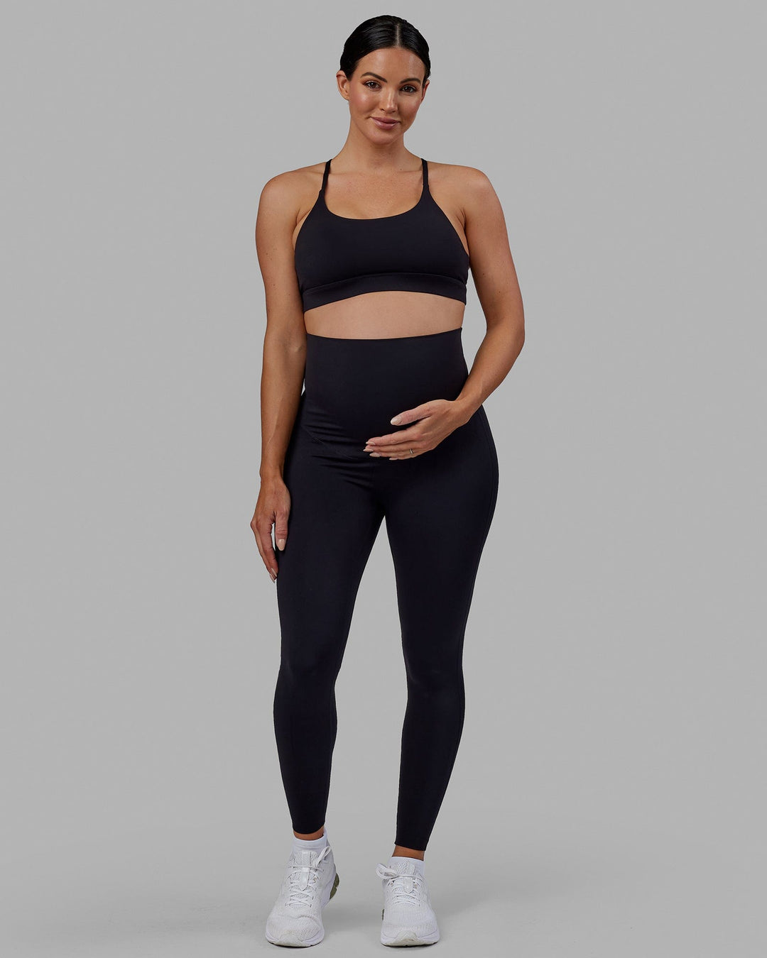 Woman wearing Elixir Ultra High-Rise Maternity Full Length Legging - Black | Model:Amanda | Size:S