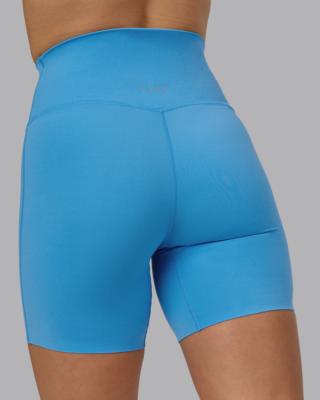 Woman wearing Elixir Ultra High-Rise 6&quot; Short - Azure Blue | Model:Halle | Size:S