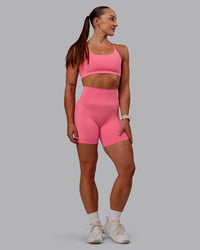 Woman wearing Elixir Ultra High-Rise 6" Short - Pink Lemonade | Size:S