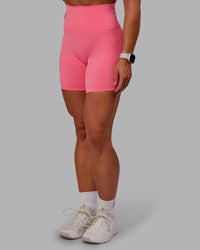 Woman wearing Elixir Ultra High-Rise 6" Short - Pink Lemonade | Size:S