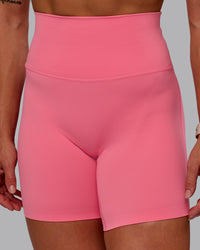 Woman wearing Elixir Ultra High-Rise 6" Short - Pink Lemonade | Size:S