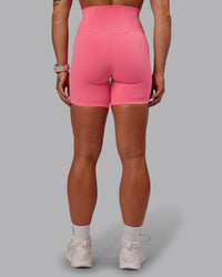 Woman wearing Elixir Ultra High-Rise 6" Short - Pink Lemonade | Size:S