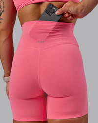 Woman wearing Elixir Ultra High-Rise 6" Short - Pink Lemonade | Size:S