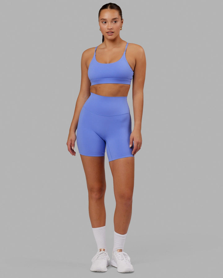 Woman wearing Elixir Mid Short Tight - Indulgent Blue