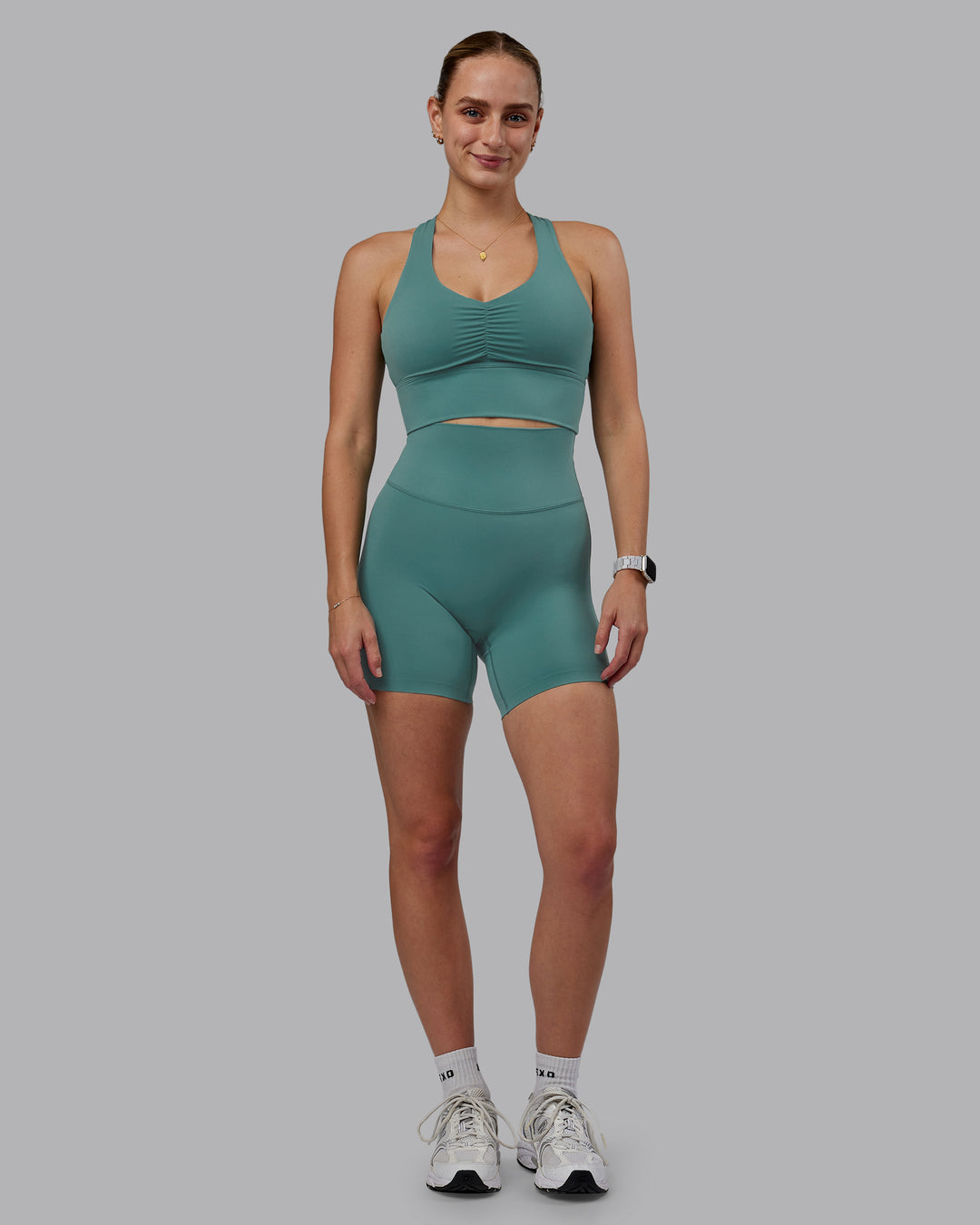 Woman wearing Elixir Ultra High-Rise 6&quot; Short - Sagebrush