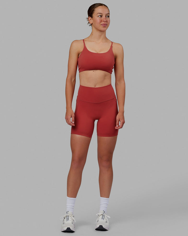 Woman wearing Elixir Mid Short Tights with Pockets - Cardinal