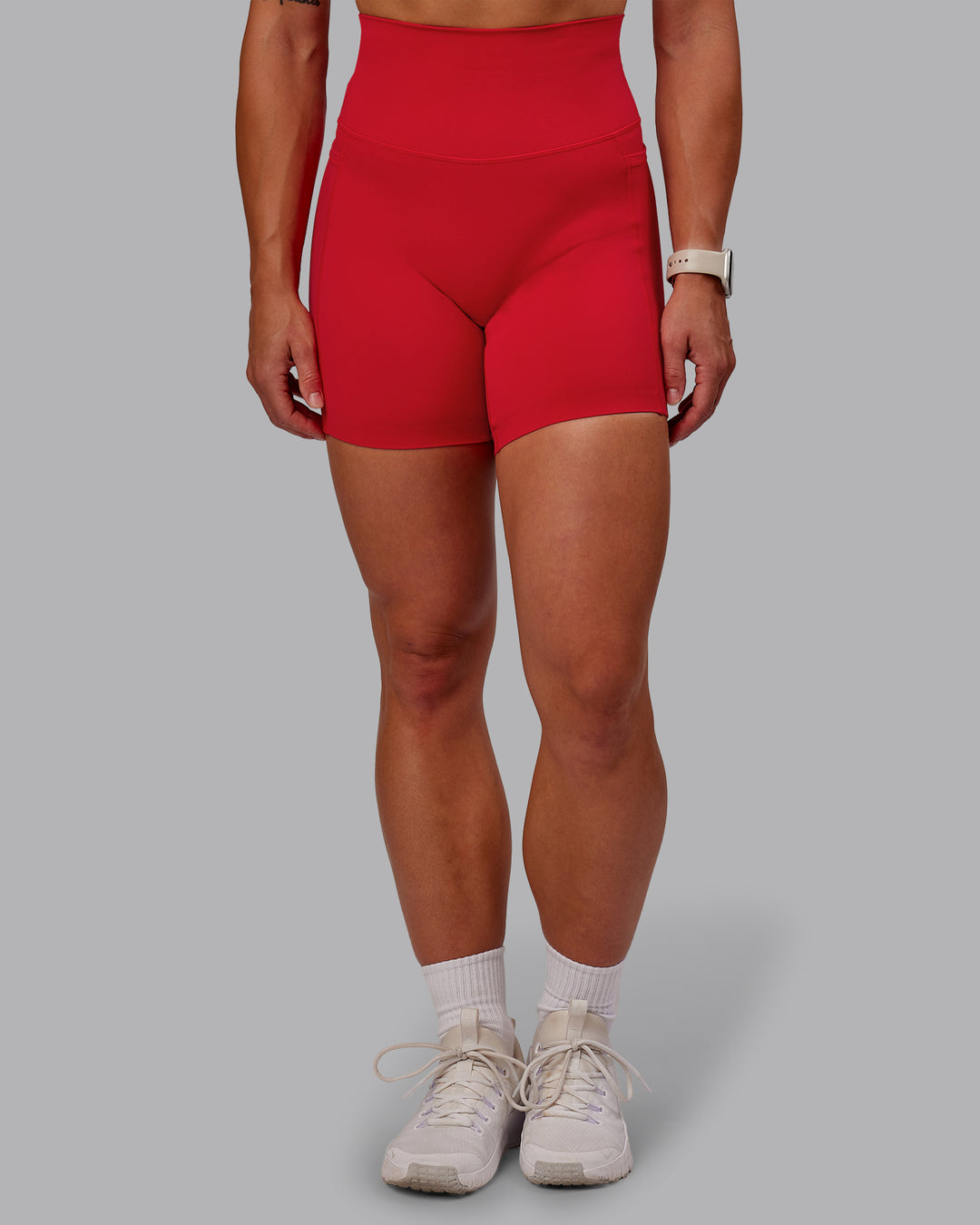 Woman wearing Elixir Ultra High-Rise 6&quot; Short Pockets - Flame | Size:S