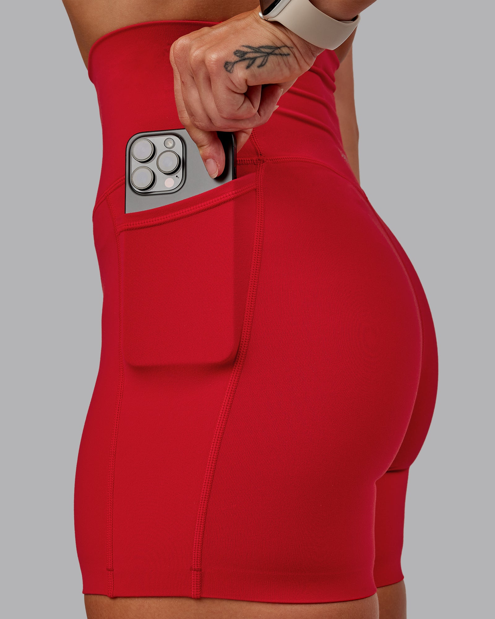 Woman wearing Elixir Ultra High-Rise 6" Short Pockets - Flame | Size:S