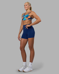 Woman wearing Elixir Ultra High-Rise 4" Short - Midnight Blue | Model:Katie | Size:S