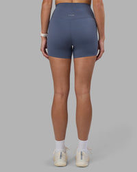 Woman wearing Elixir Ultra High-Rise 4" Short - Night Shadow | Model:Phoebe | Size:S