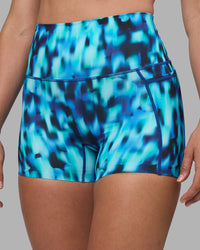 Woman wearing Elixir Ultra High-Rise 4" Short Pockets - Luminous | Model:Sophie | Size:S