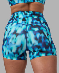 Woman wearing Elixir Ultra High-Rise 4" Short Pockets - Luminous | Model:Sophie | Size:S