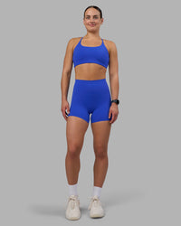 Woman wearing Elixir Ultra High-Rise 4" Short - Power Cobalt | Model:Keisha | Size:S