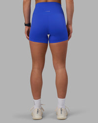 Woman wearing Elixir Ultra High-Rise 4" Short - Power Cobalt | Model:Keisha | Size:S