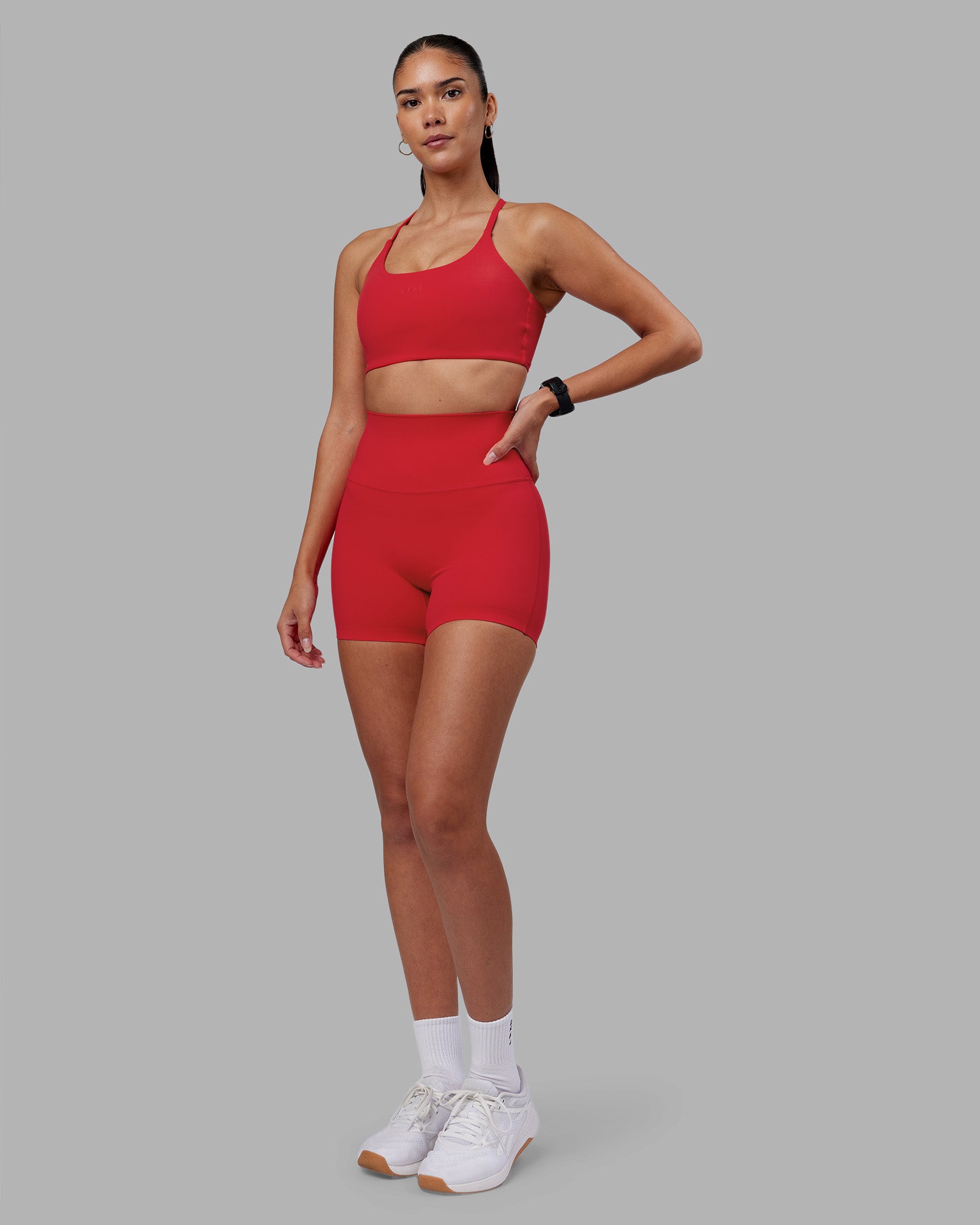 Woman wearing Elixir Ultra High-Rise 4" Short - Scarlet | Model:Rhiley | Size:S